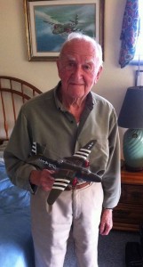Karl Haeuser with a model of his A-20, "Mopsy."