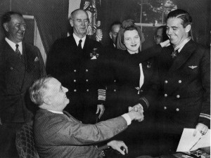 Butch O'Hare, accompanied by his wife, Rita, receiving the Medal of Honor from President Franklin D. Roosevelt.
