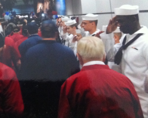 Gordon Scott being saluted by active duty sailors from NAS Lemoore upon returning from Central Valley Honor Flight (photo courtesy of Larry McFarland)