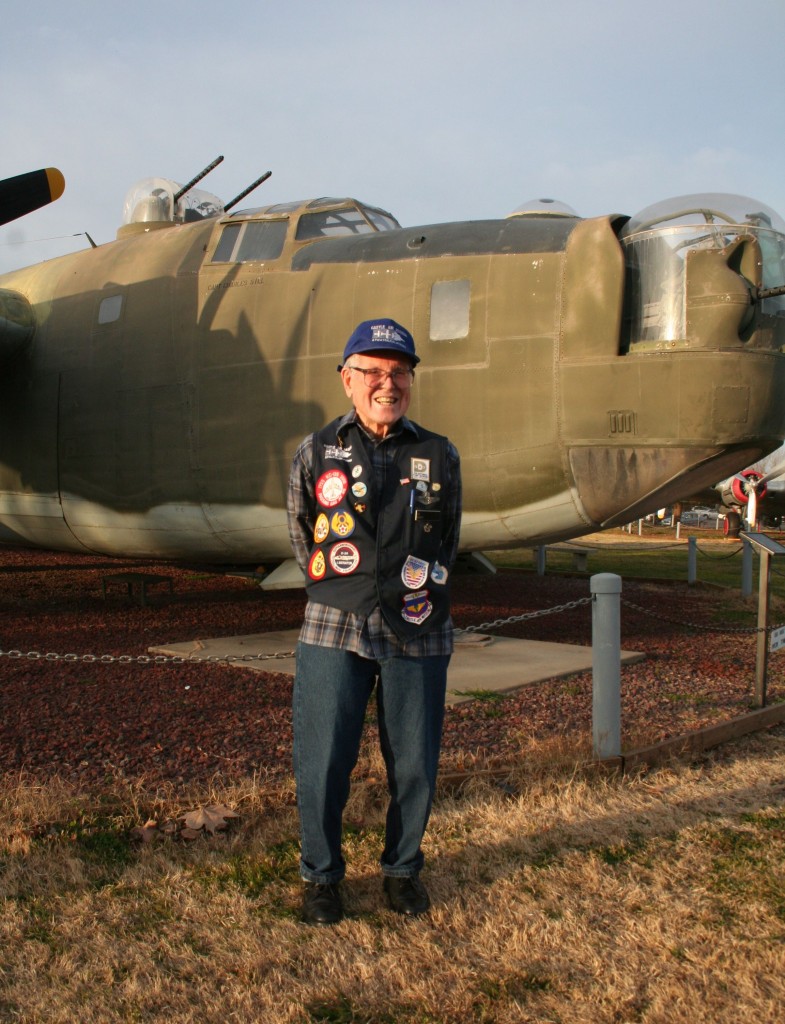 Ed Nacey in front of a B-24 at Castle Air Museum.