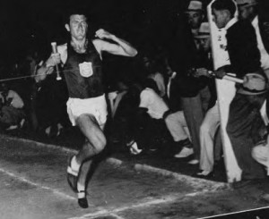 Louis Zamperini taking the tape at the West Coast Relays in Fresno, CA