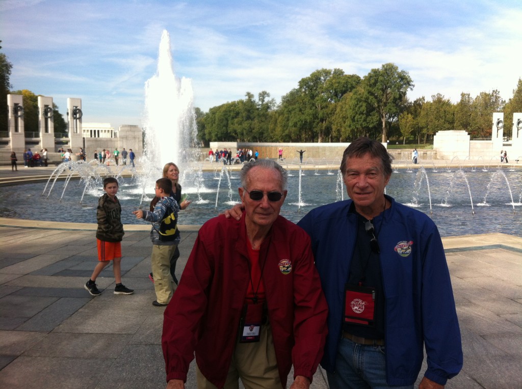 93-year-old WWII Army veteran Charles Stines at the National World War II Memorial with his son, Darryl, an Army veteran from the Vietnam era.