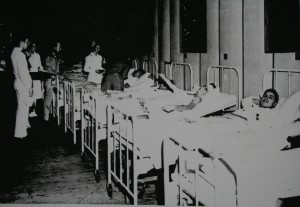 Bill Crumpacker (second bed from right) recovering at a hospital on New Caledonia.