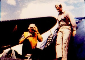 Ensign Eddy Fayle (right) on the wing of his TBD, aboard the USS Hornet in May 1942. This image is taken from the film John Ford made to memorialize the men of Torpedo Squadron 8 who died at Midway.
