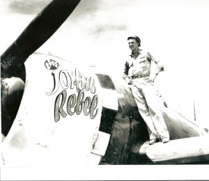 Winston Handwerker on the wing of his P-47, The Joyful Rebel.