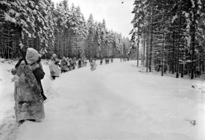 82nd Airborne troops trudge through the snow during the Battle of the Bulge.