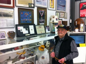 Bill Gornik with some of the items he donated to the Warhawk Air Museum in Nampa, ID.