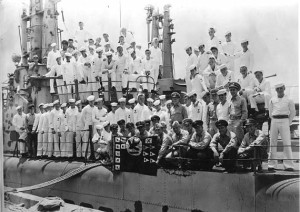 The crew of the USS Sea Robin (SS-407) celebrating victory after World War II.