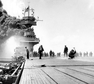 The USS Yorktown under attack at Midway.