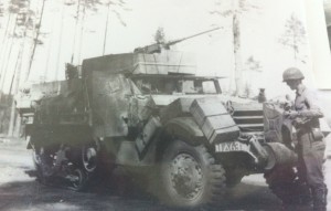 George was riding in the back of an 11th Armored half track like this one when a German artillery shell hit the vehicle.