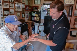 George shows me his Lifetime Achievement ring from the Professional Baseball Scouts Foundation.