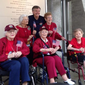 Peggy (right) with the other four female WWII veterans on her Central Valley Honor Flight, pose at the Women in Military Service for America memorial with CVHF president Al Perry.
