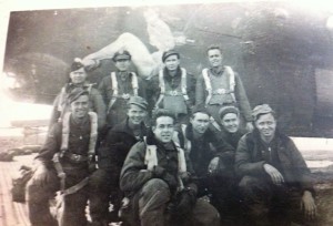 Jim Roach (standing, second from left), and his B-24 crew with the 485th Bomb Group, 830th Squadron.