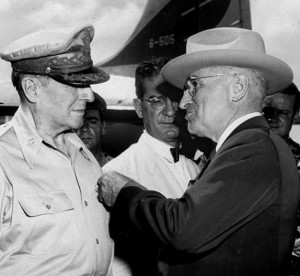 President Harry Truman pins the Distinguished Service Cross on General Douglas MacArthur in 1950 (AP Photo)