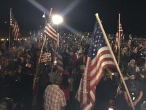 Jim and his daughter, Michele Le Clerc, make their way through a huge homecoming crowd at the former Castle AFB in Atwater, CA.