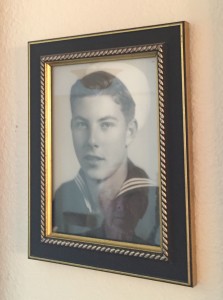 91-year-old Bob Dodds reflected in a photo of his 17-year-old sailor self. For more photos, visit the Hometown Heroes facebook page.