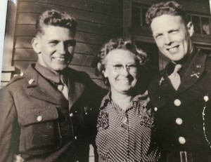 Doug (left) and Bert Justus with their mother during World War II.
