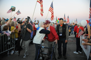 Al Peguero receives a warm welcome home from his 2014 Honor Flight at Castle Airport. (photo by Kendyl Day)