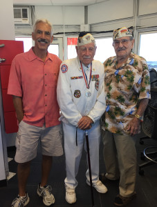 Chester "Ski" Biernacki (right) and Delton "Wally" Walling (center) with Chace Anderson inside the observation tower at Pearl Harbor on December 6, 2016. (photo courtesy: Chace Anderson)