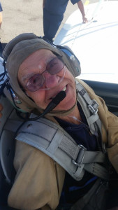 Asbury in the cockpit of a World War II-era Stearman biplane.