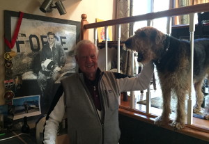 General Titus at home with his dog, Oscar.